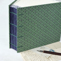 green and purple-photo album-coptic stitch-purple guards-handmade-london