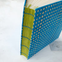 spot-coptic-album-stitch detail-exposed stitch-handmade-the idle bindery